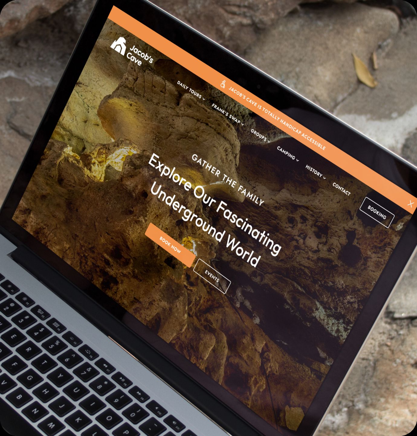 Jacob's cave web design portfolio mockup on a laptop