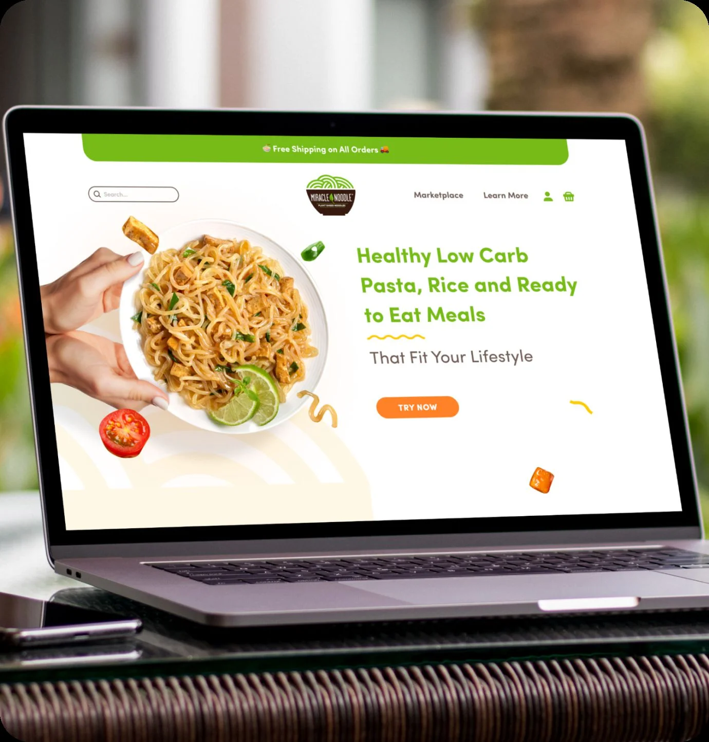 Miracle noodle web design portfolio mockup on a laptop