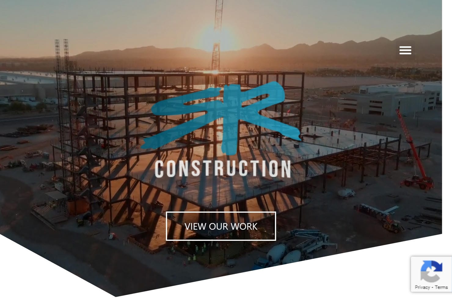 A construction site with a crane on the SR Construction website