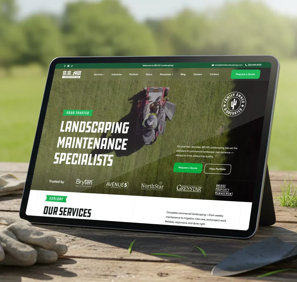A tablet displays a landscaping website with "LANDSCAPING MAINTENANCE SPECIALISTS" on a green background.