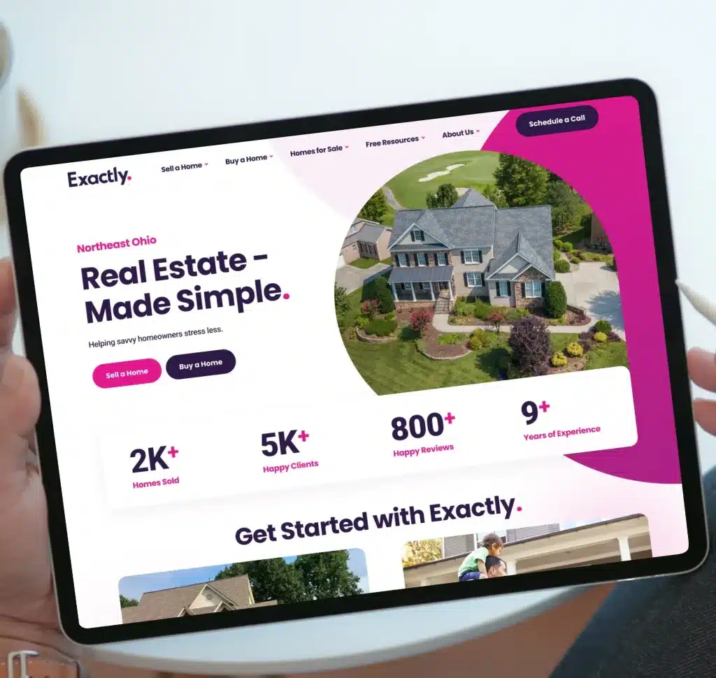 A person holds a tablet displaying the "Exactly." real estate website with "Real Estate – Made Simple." text.