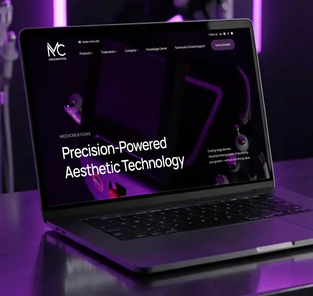 A laptop displays a website with "Precision-Powered Aesthetic Technology" on a dark background with purple light.