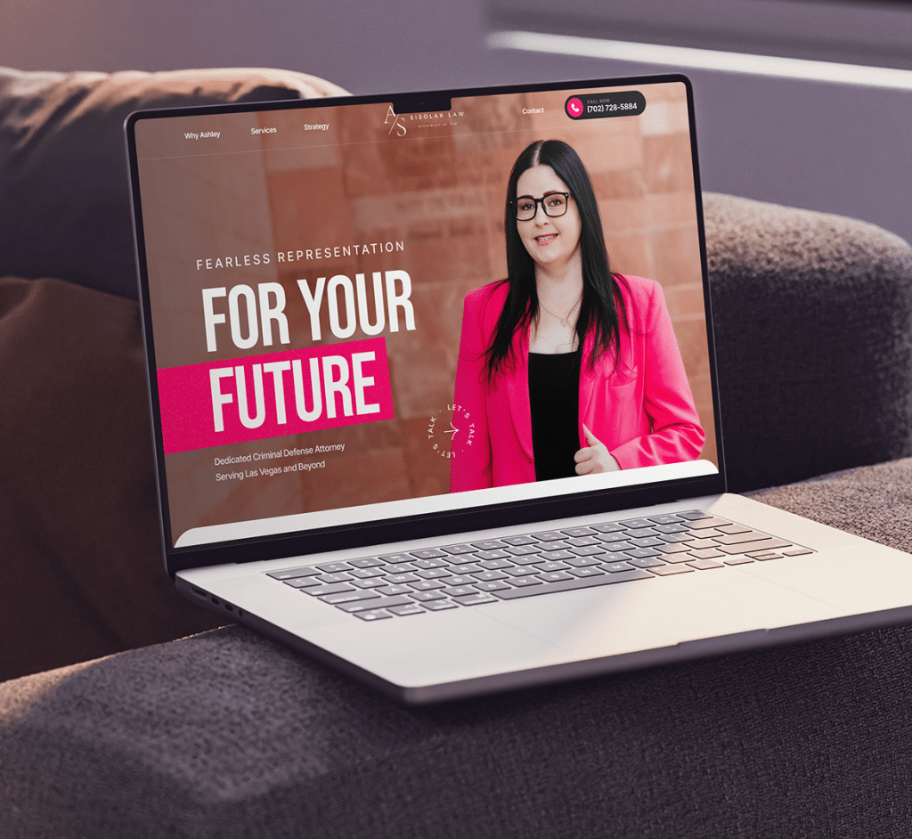 A laptop displays a website with a smiling woman in a pink blazer and text "FOR YOUR FUTURE".