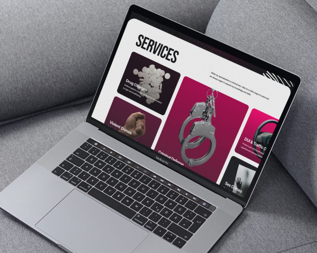 A MacBook Pro displays a website with "SERVICES" prominently, showing criminal defense categories like "Drug Charges" and "Criminal Defense" with handcuffs.