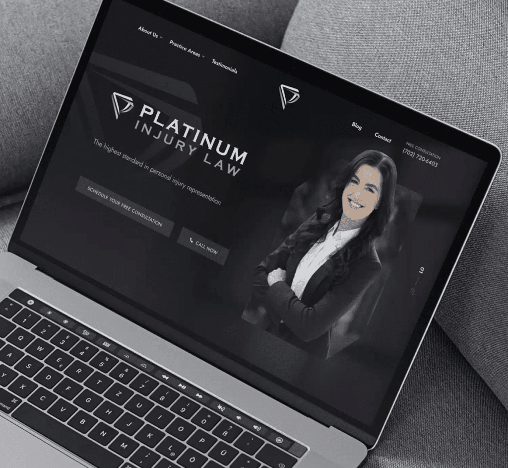 A laptop displays the "Platinum Injury Law" website with a smiling woman and "Schedule Your Free Consultation."