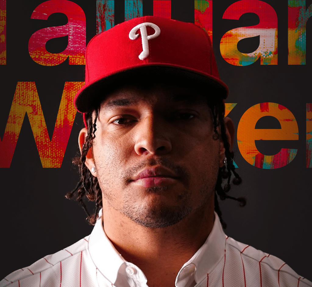 A man in a red Phillies cap and pinstriped shirt looks forward, with "Walker" in colorful letters behind him.