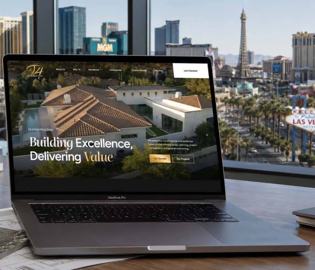 A MacBook Pro displays a construction website with "Building Excellence, Delivering Value" and a Las Vegas skyline.