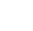 A white background with a faint, dark, rounded rectangular shape in the bottom left corner.